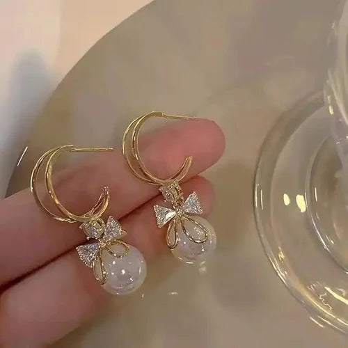 Golden Bow Pearl Drop Earrings