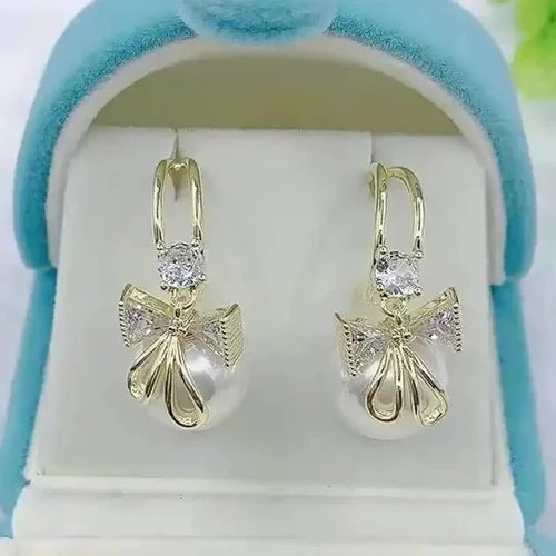 Golden Bow Pearl Drop Earrings